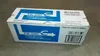 A cardboard box containing a Kyocera toner cartridge. Voir les images du produit