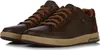 A pair of brown Skechers sneakers is shown against a white background. Voir les images du produit
