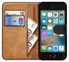 A book-style phone case for an iPhone 5 S SE, open to reveal card slots and cash, with the phone screen displaying various app icons. Anteprima dell’immagine prodotto