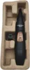 A black and gold precision trimmer is shown in its molded paper packaging. Podgląd zdjęcia produktu