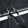 Close-up view of gas struts inside a dark gray storage box. Produktbild-Vorschau