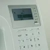 Close-up of the control panel and screen of a white sewing machine. Produktbild-Vorschau