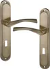 Two door handles with backplates, presented against a white background. Produktbild-Vorschau