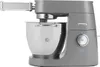 A gray Kenwood stand mixer with a silver bowl and a pasta attachment. Produktbild-Vorschau