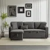 A gray sectional sofa with a chaise lounge is shown in a living room setting. Náhľad obrázku produktu