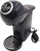 A dark gray Krups Dolce Gusto capsule coffee machine is shown against a white background. Voir les images du produit