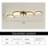 A diagram showing the dimensions of a modern ceiling lamp with multiple rings. Voir les images du produit