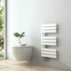 A modern bathroom with a wall-mounted toilet and a white towel radiator. Podgląd zdjęcia produktu