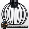A black metal cage lampshade is shown, with a small inset image of a blacksmith working at an anvil. Text overlays the bottom of the image. Produktbild-Vorschau