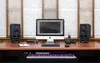 A recording studio desk setup with a computer, speakers, keyboard, and headphones. Náhľad obrázku produktu