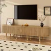 A TV stand with a TV mounted above it in a living room setting. Produktbild-Vorschau
