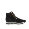 A black leather high-top sneaker with a gold zipper is shown against a white background. Produktbild-Vorschau