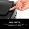 A close-up of a hand pressing a button on a black trash can lid. Produktbild-Vorschau