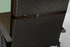 Close-up of the back of a brown woven chair cushion with a strap holding it in place. Produktbild-Vorschau