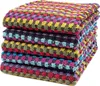 A stack of colorful kitchen towels. Produktbild-Vorschau