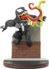 A Venom Q-Fig diorama figure perched on a brick structure. Produktbild-Vorschau
