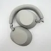 Overhead view of a pair of silver Sony headphones on a white background. Produktbild-Vorschau