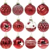 A collection of twelve red glass Christmas ornaments arranged in two rows of six. Produktbild-Vorschau