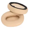 Two beige ear pads for headphones are shown against a white background. Podgląd zdjęcia produktu