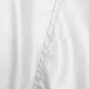 A close-up view of white fabric with a seam. Produktbild-Vorschau