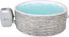 A round inflatable hot tub filled with blue water, with a control unit attached to the side. Produktbild-Vorschau