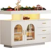 A white sideboard with glass doors and drawers, decorated for Christmas. Anteprima dell’immagine prodotto