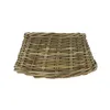 A woven rattan tree collar on a white background. Náhľad obrázku produktu