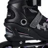 Close-up of a black inline skate with purple and gray accents. Voir les images du produit