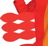 Close-up of a red costume with three red, fin-like appendages attached to the side. Produktbild-Vorschau