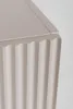 A close-up view of the fluted detail on a beige cabinet. Náhľad obrázku produktu