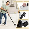 A man is using a steam cleaner in a kitchen. Voir les images du produit