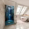 A modern bathroom with a bathtub, toilet, and a shower with a waterfall graphic on the wall. Produktbild-Vorschau