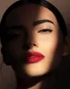 Close-up of a woman's face with dramatic lighting. Anteprima dell’immagine prodotto