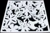 A white decorative screen with floral and butterfly cutouts against a black background. Náhled obrázku produktu