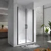 A modern bathroom with a black-framed glass shower enclosure. Produktbild-Vorschau