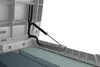 Close-up view of a gas strut mechanism attached to the lid of a white storage box, with two cushions visible inside. Produktbild-Vorschau