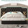 A bed with a tufted headboard and side panels, featuring built-in reading lights. Produktbild-Vorschau