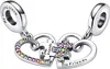Two silver heart-shaped charms connected by puzzle pieces, adorned with colorful stones. Anteprima dell’immagine prodotto