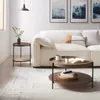 A living room scene with a couch, coffee table, and side table. Produktbild-Vorschau