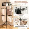 A multi-tiered drying rack with various clothing items, including socks and towels, displayed on different levels. The image also includes close-ups of the drying rack's features and text highlighting its capacity and functionality. Anteprima dell’immagine prodotto