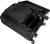 An open black suitcase with its lid propped up, showing the interior and wheels. Produktbild-Vorschau