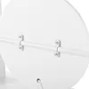 A close-up view of a white circular object with a metal rod attached by brackets. Produktbild-Vorschau