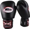 A pair of black boxing gloves with branding. Produktbild-Vorschau