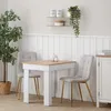 A dining set with a table and two chairs in a room setting. Produktbild-Vorschau