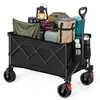 A black folding wagon filled with camping gear. Produktbild-Vorschau