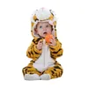 A baby wearing a tiger costume and holding an orange ball. Produktbild-Vorschau
