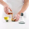 Lékué, dispensador para aderezos, 180 ml Vista previa de la imagen del producto 8