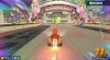 A racing game scene with Mario in a kart on a track. Produktbild-Vorschau