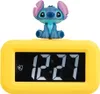 A yellow digital alarm clock with a Stitch figurine on top. Anteprima dell’immagine prodotto