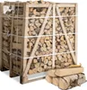 A large wooden crate filled with firewood, with a few pieces of firewood stacked in front of it. Produktbild-Vorschau